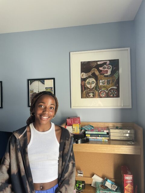 Student in Residence Hall with ArtMate Selection