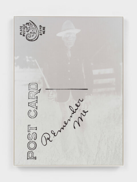 Inverted image of an African American soldier holding a gun, with a stamp and the words 