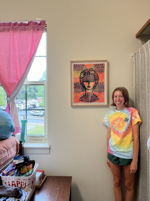 Student with art in their room